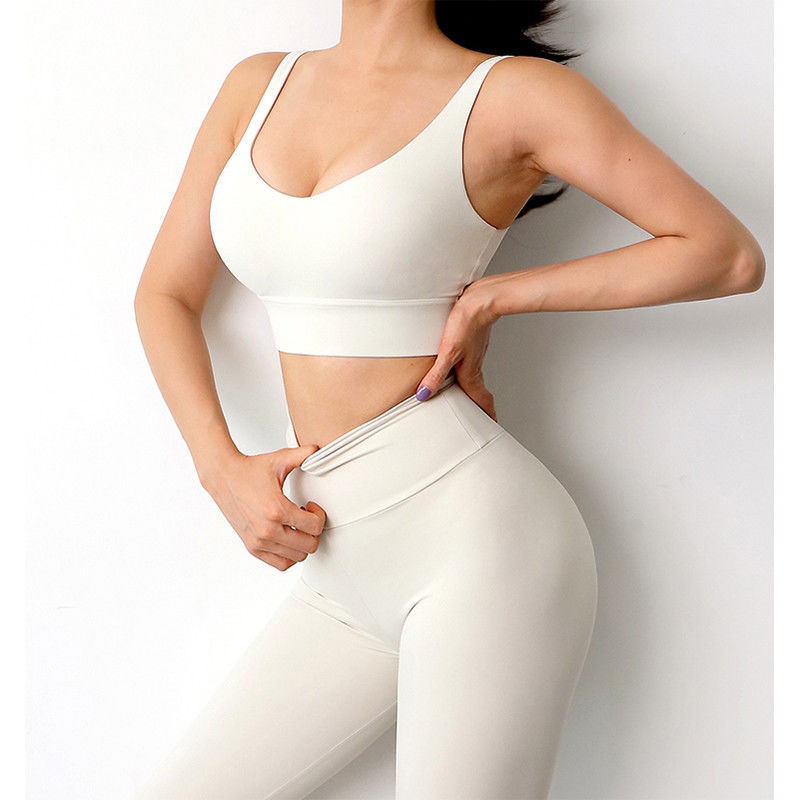 Les vêtements respirables de yoga de gymnase ont sous peu gainé les guêtres de séance d'entraînement du gymnase des femmes ont sué Wicking